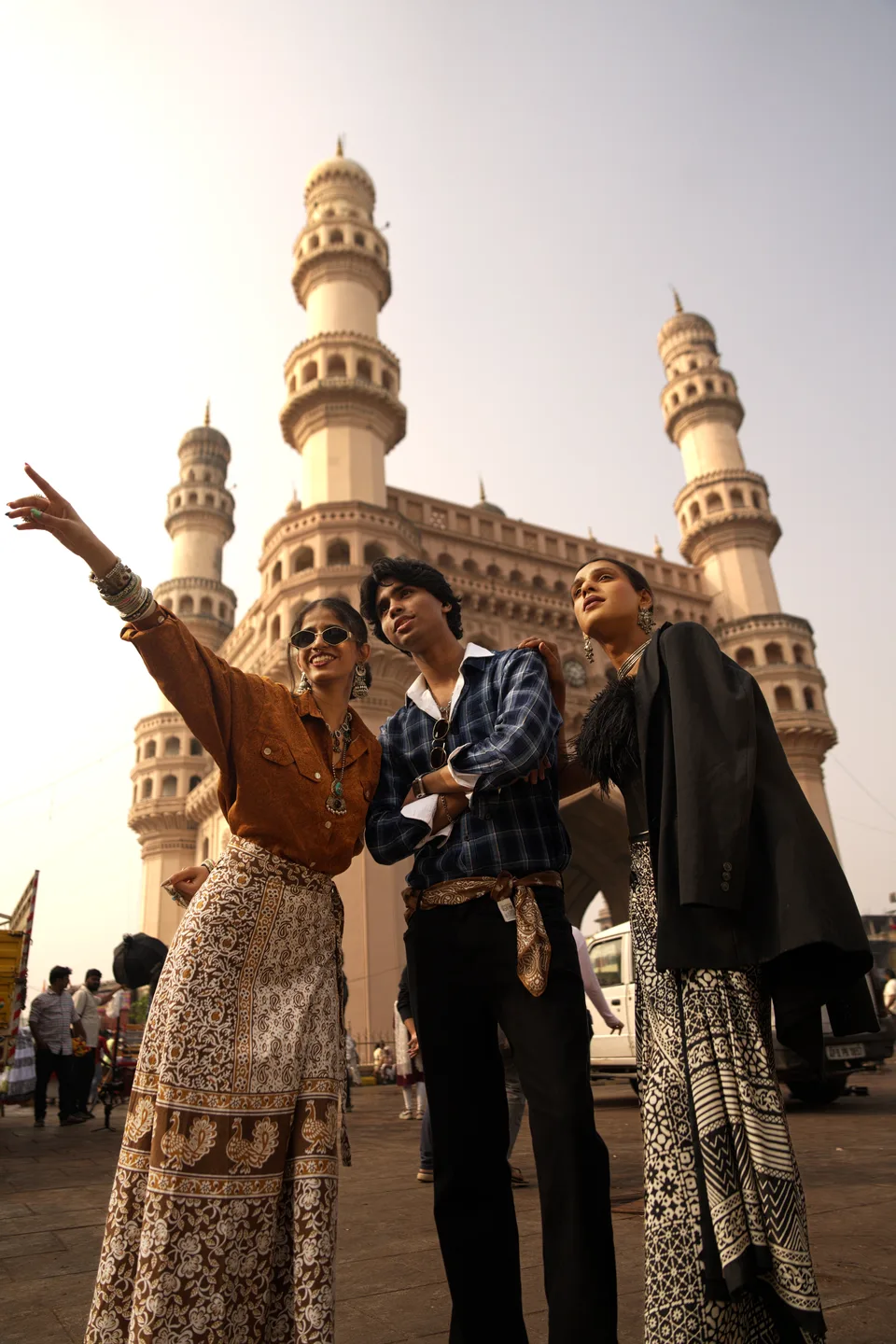 Flux editorial — styled portraits at the Charminar, golden hour